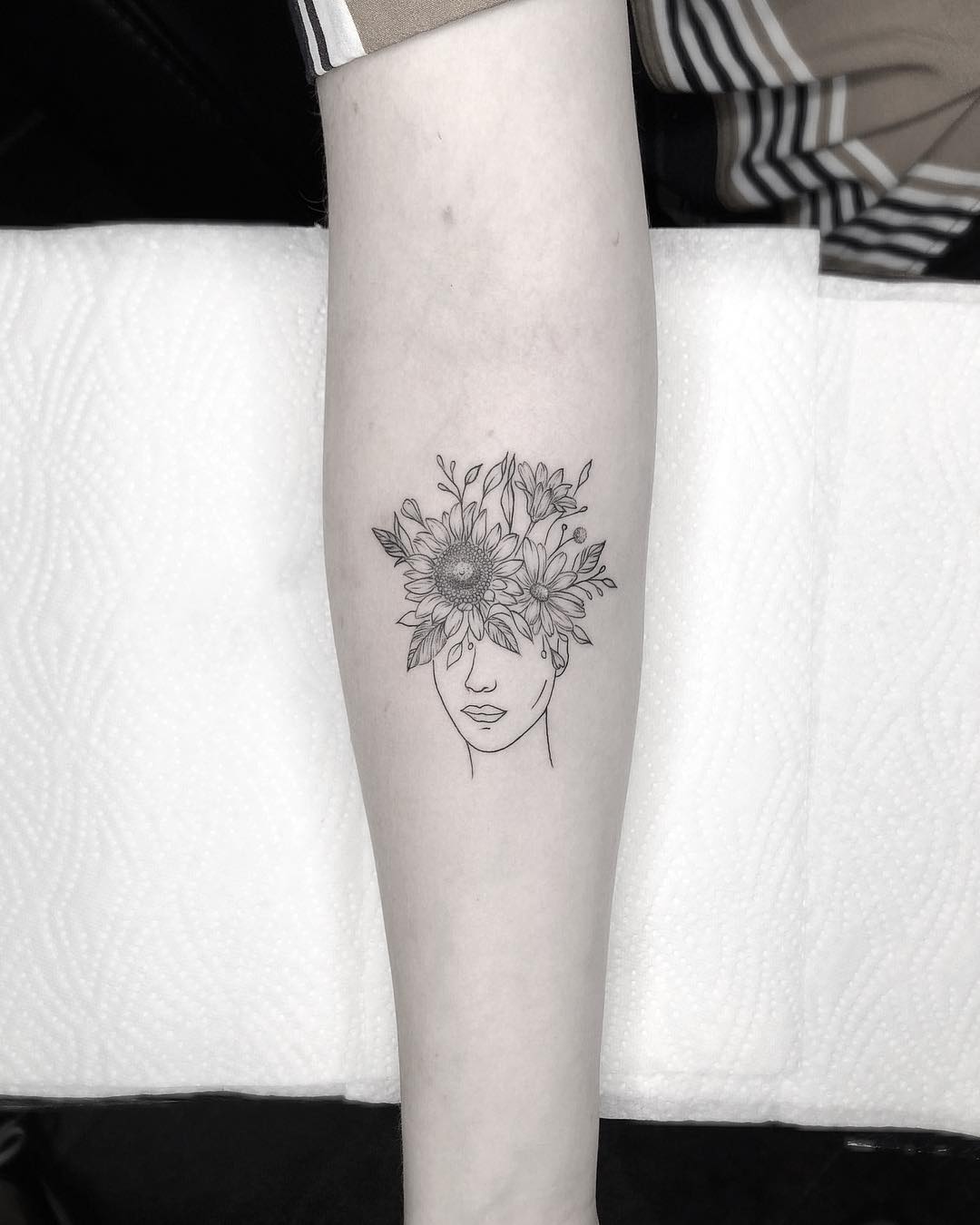 Female body with flower head